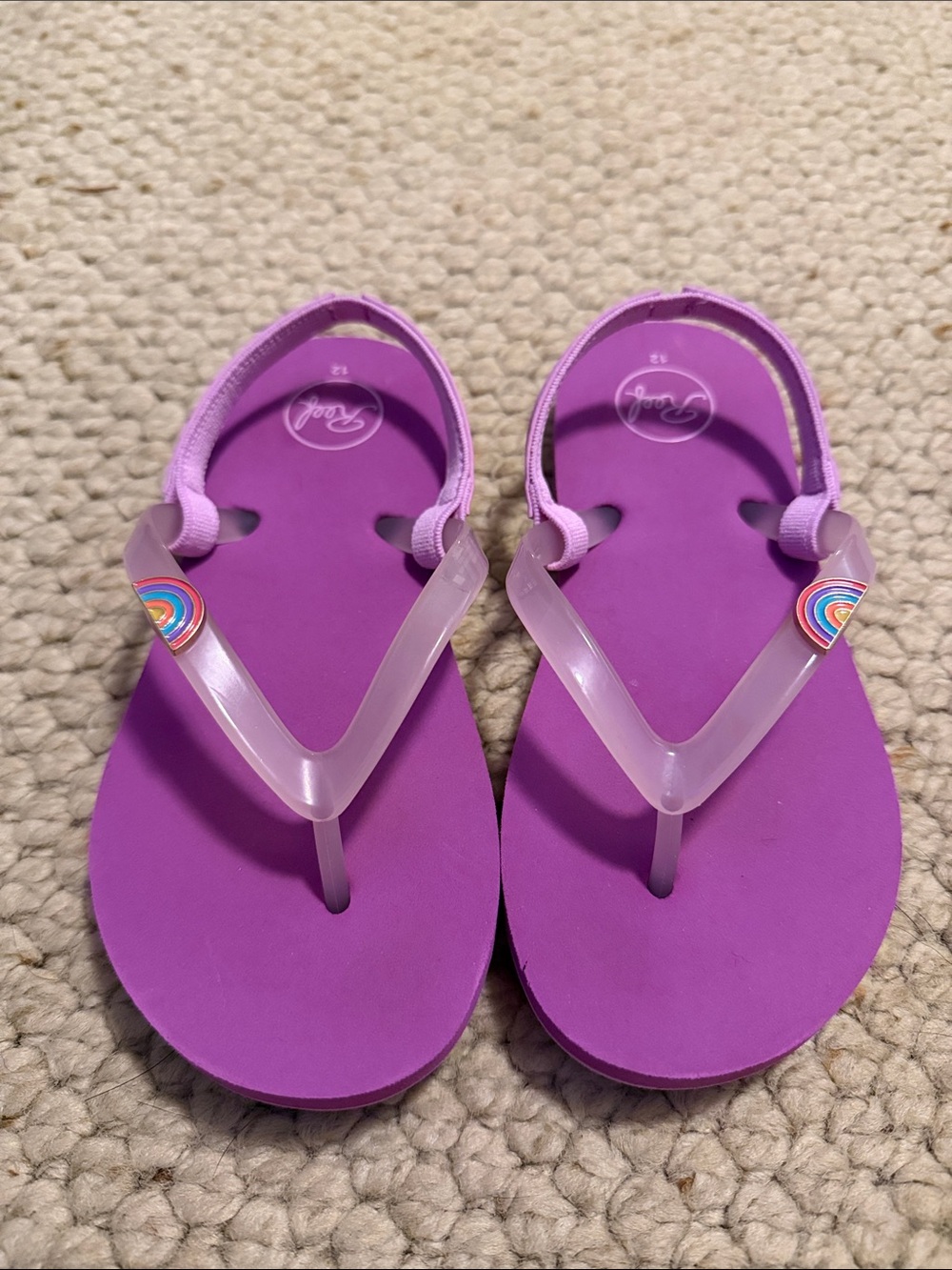 Like new Reef rainbow flip flops, size 12